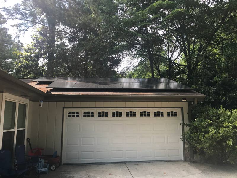 Residential rooftop solar panels providing clean, renewable energy in Atlanta, GA.
