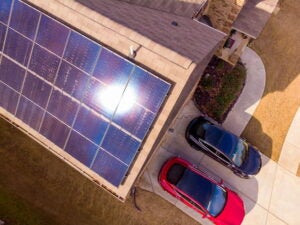 Aerial view of rooftop solar panels on a residential home in Atlanta, GA
