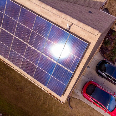 aerial view of home with solar panels